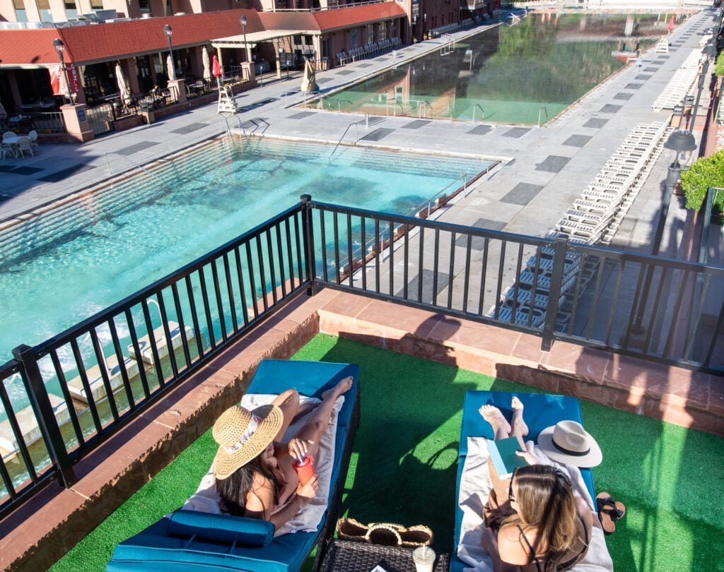 Two Women Lounging in the Sun at the Overlook at Glenwood Hot Springs Resort