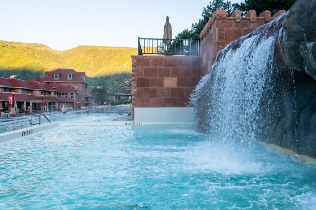 The Falling Water pool and waterfall in the Yampah Mineral Baths at Glenwood Hot Springs Resort