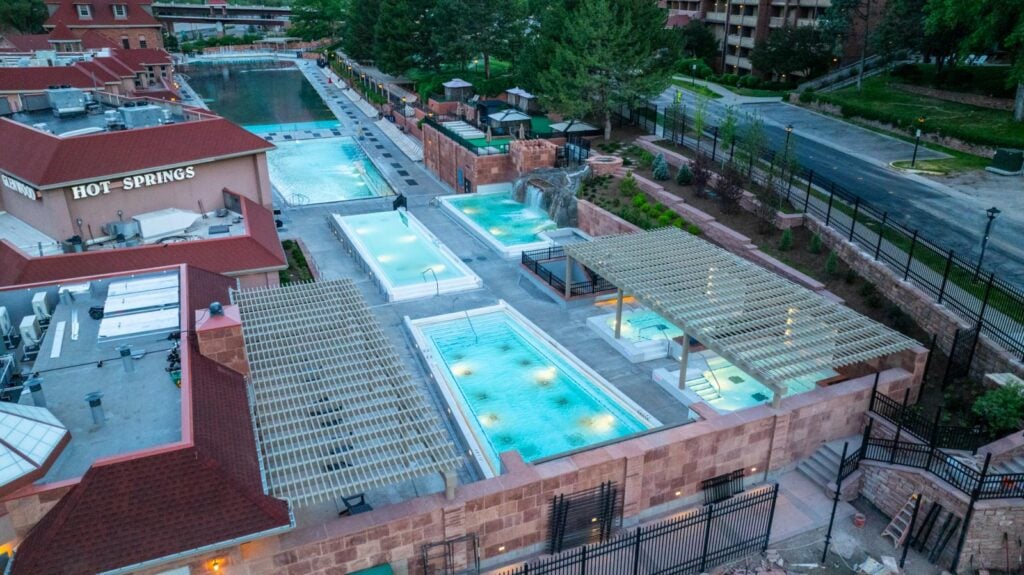 Aerial view of Yampah Mineral Baths looking toward the Therapy and Grand Pools at Glenwood Hot Springs Resort