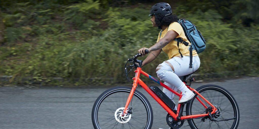 Woman riding on e-bike near Glenwood Hot Springs Resort