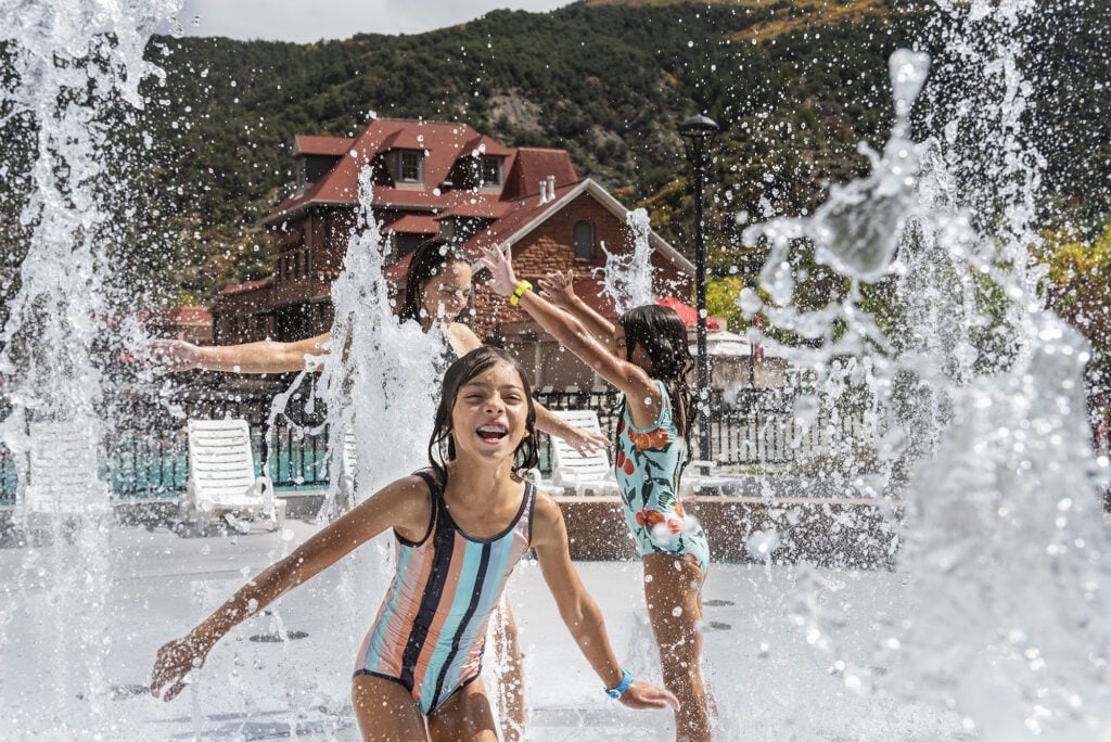 Girl Playing in Splash Pad Fountain at Glenwood Hot Springs Resort