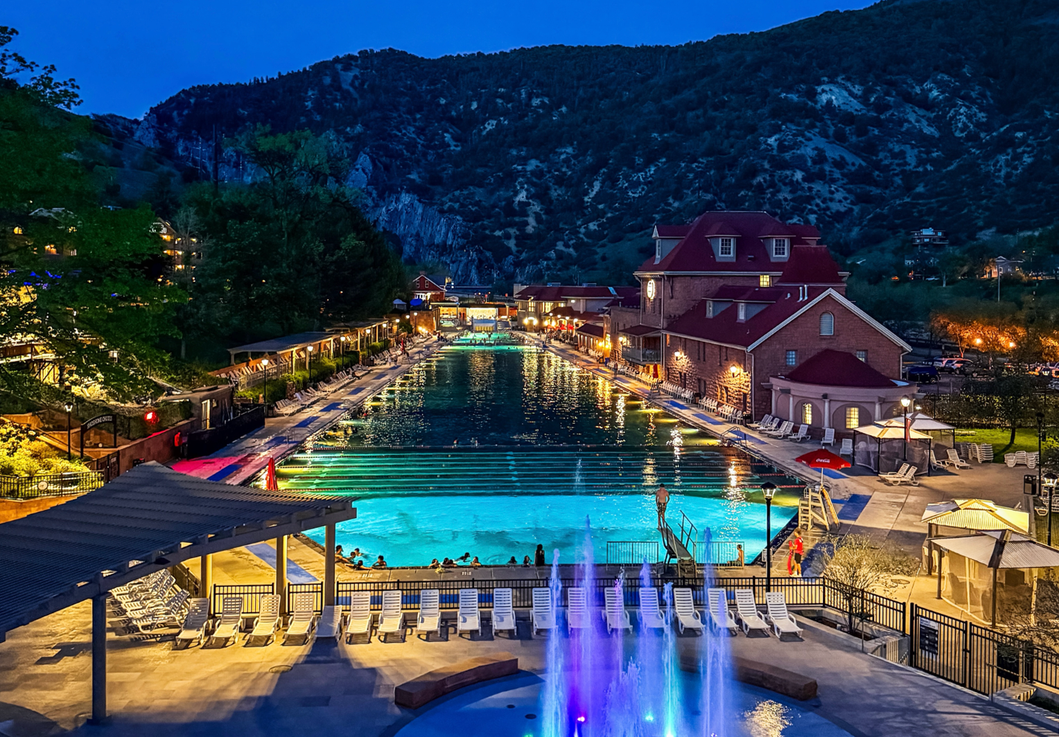 View at dusk of the Glenwood Hot Springs Resort from the pedestrian bridge to downtown Glenwood Springs