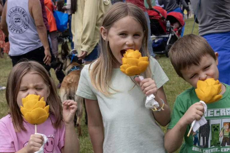 Kids enjoying fruit pops at the Strawberry Days Festival near Glenwood Hot Springs Resort