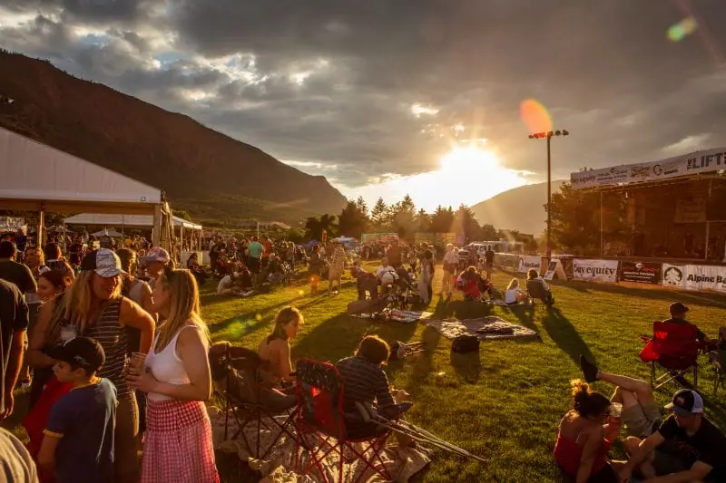 Sun setting over the guests at Strawberry Days Festival near Glenwood Hot Springs Resort