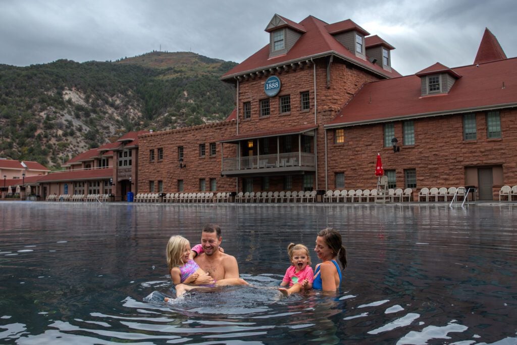 Family enjoying the Grand Pool at Glenwood Hot Springs Resort